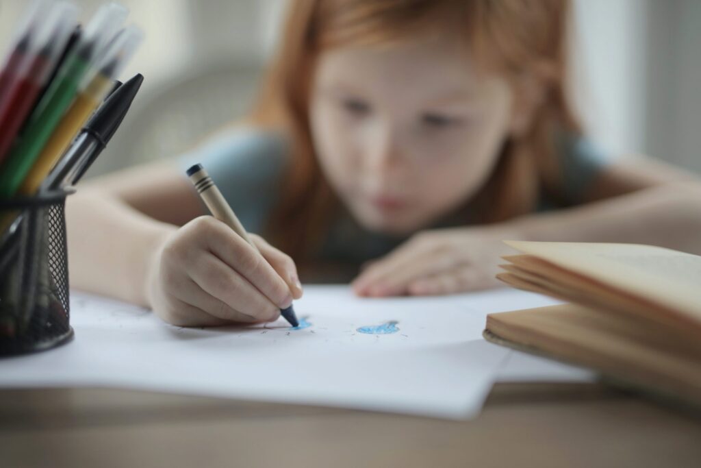 girl holding crayon coloring white paper 3891193